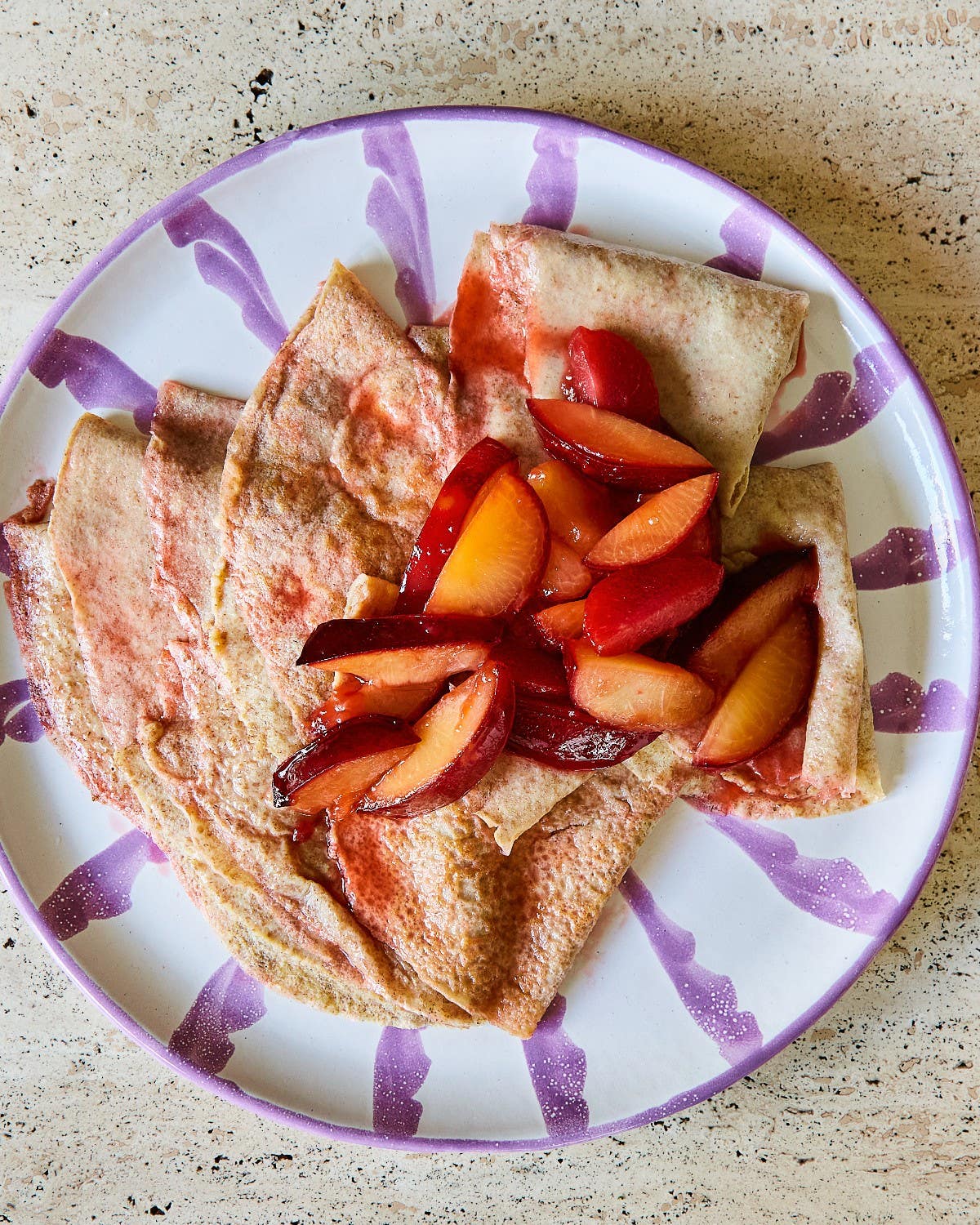 Plum Crepes on Purple Plate