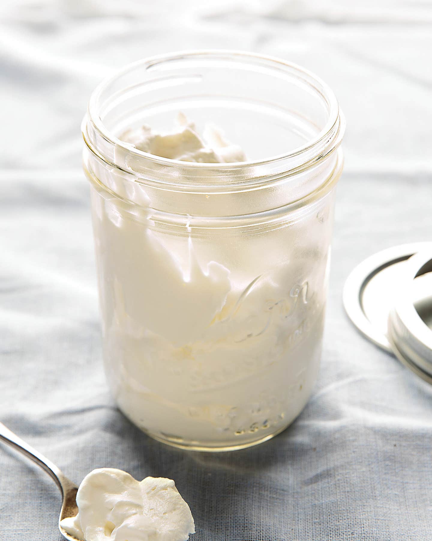 freshly whipped cream in a Mason jar